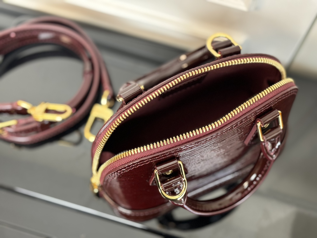 Louis Vuitton Nano Alma Handbag in Glossy Burgundy Epi Leather - Image 5