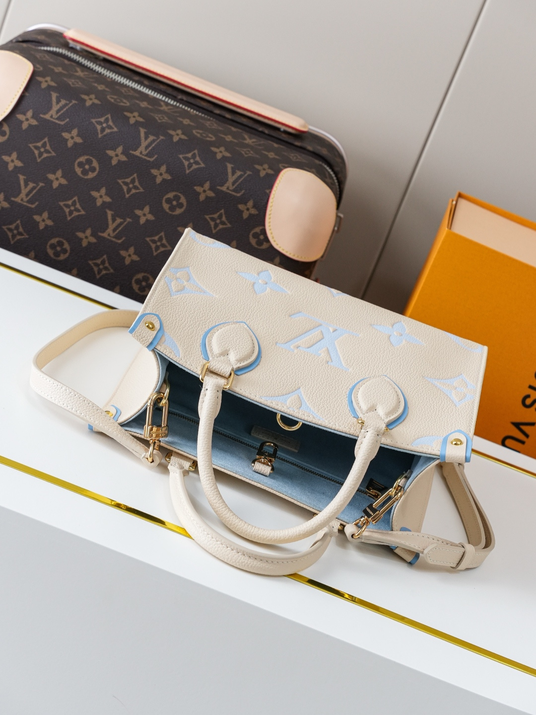 Louis Vuitton OnTheGo Small Tote Bag in Bicolor Monogram Empreinte Leather - Image 6