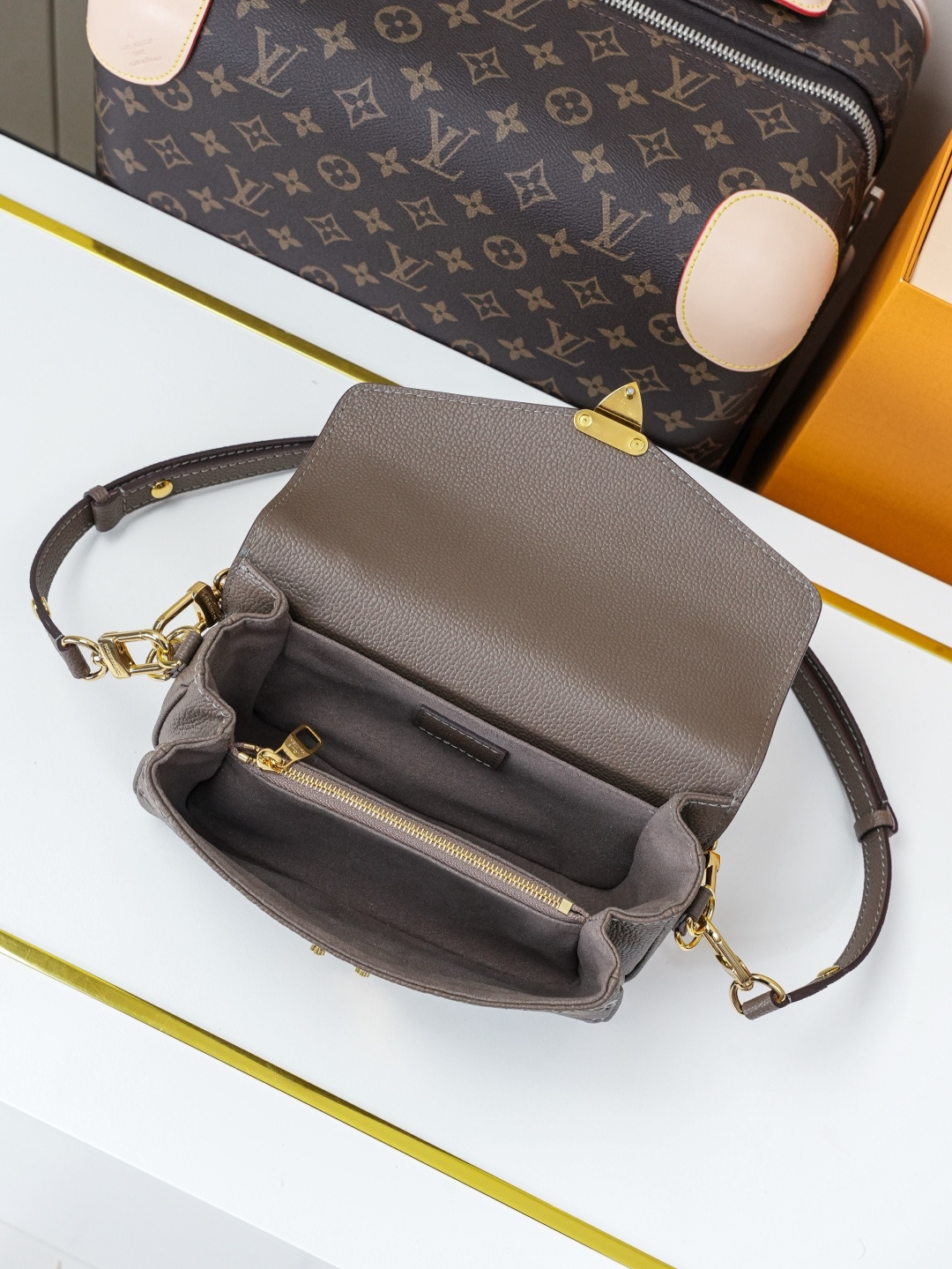 Louis Vuitton Pochette Métis East West Crossbody Bag in Monogram Empreinte Leather - Image 7