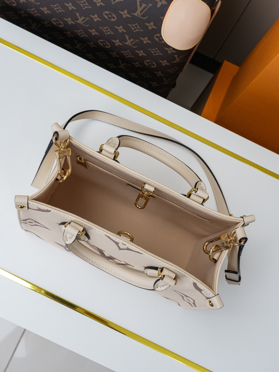 Louis Vuitton OnTheGo Small Tote Bag in Monogram Empreinte Leather - Image 7