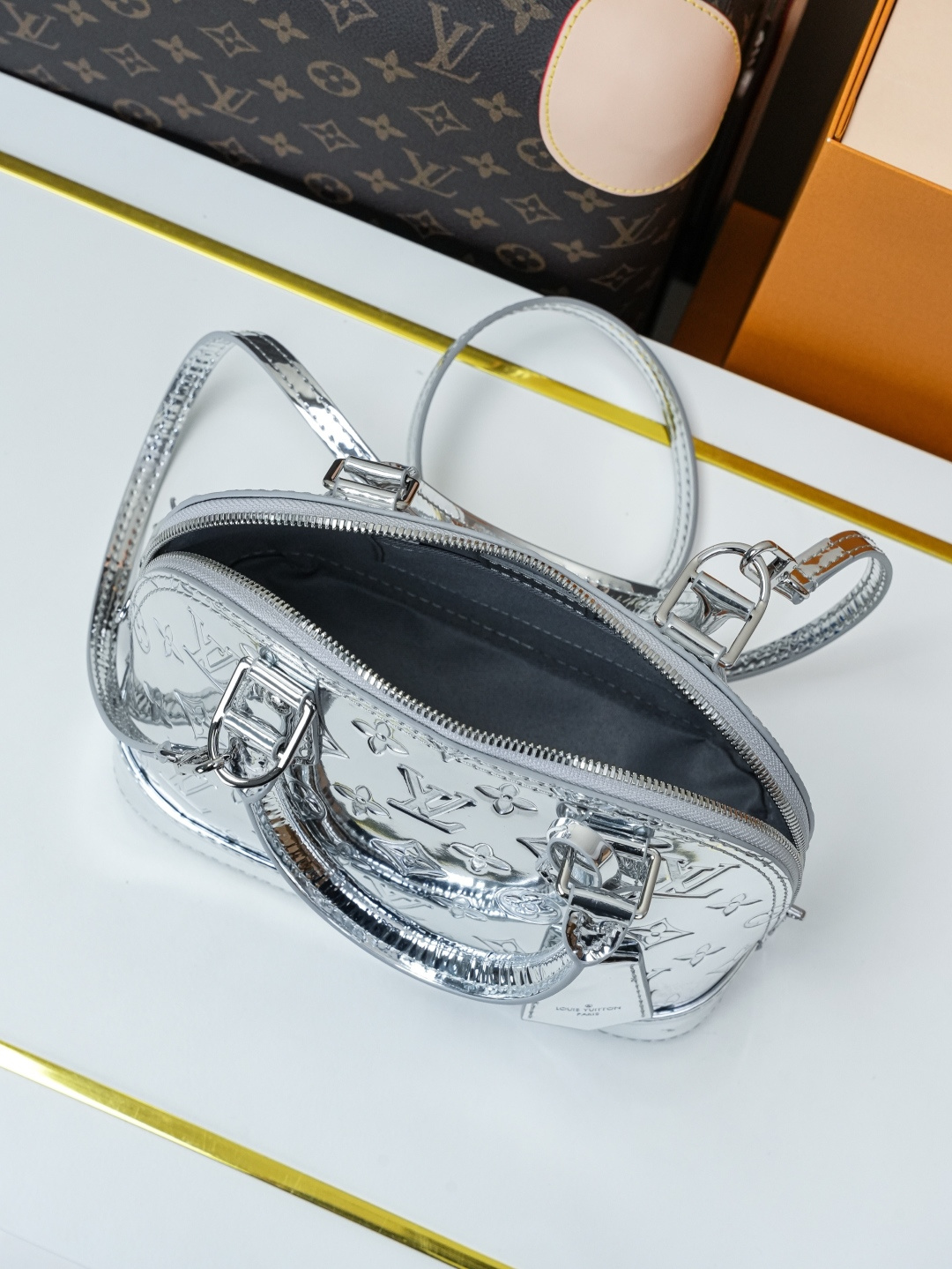Louis Vuitton Alma BB Handbag in Silver Monogram Miroir Canvas - Image 7