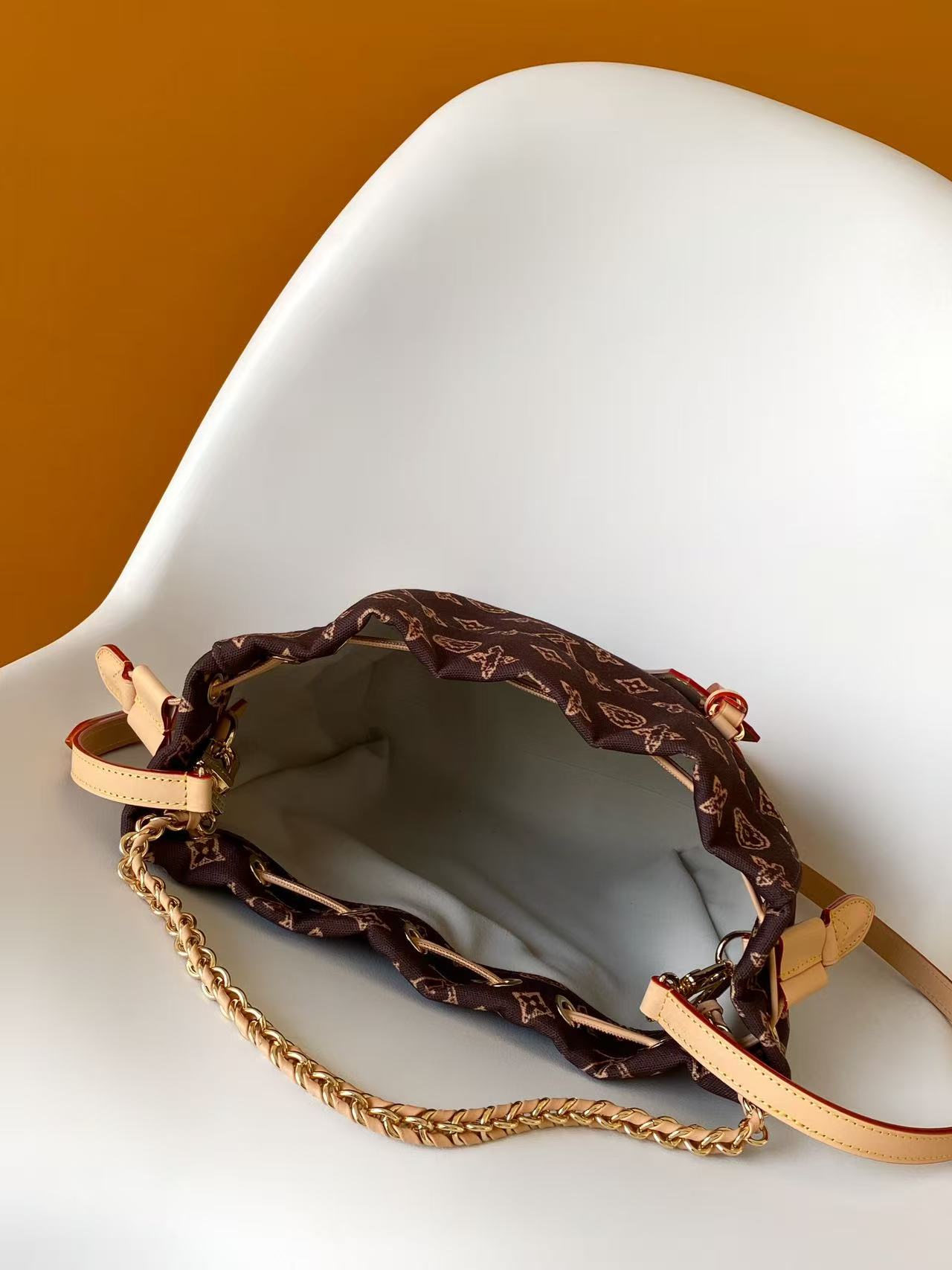 Louis Vuitton Noé Handbag in Monogram Reverse Canvas - Image 7