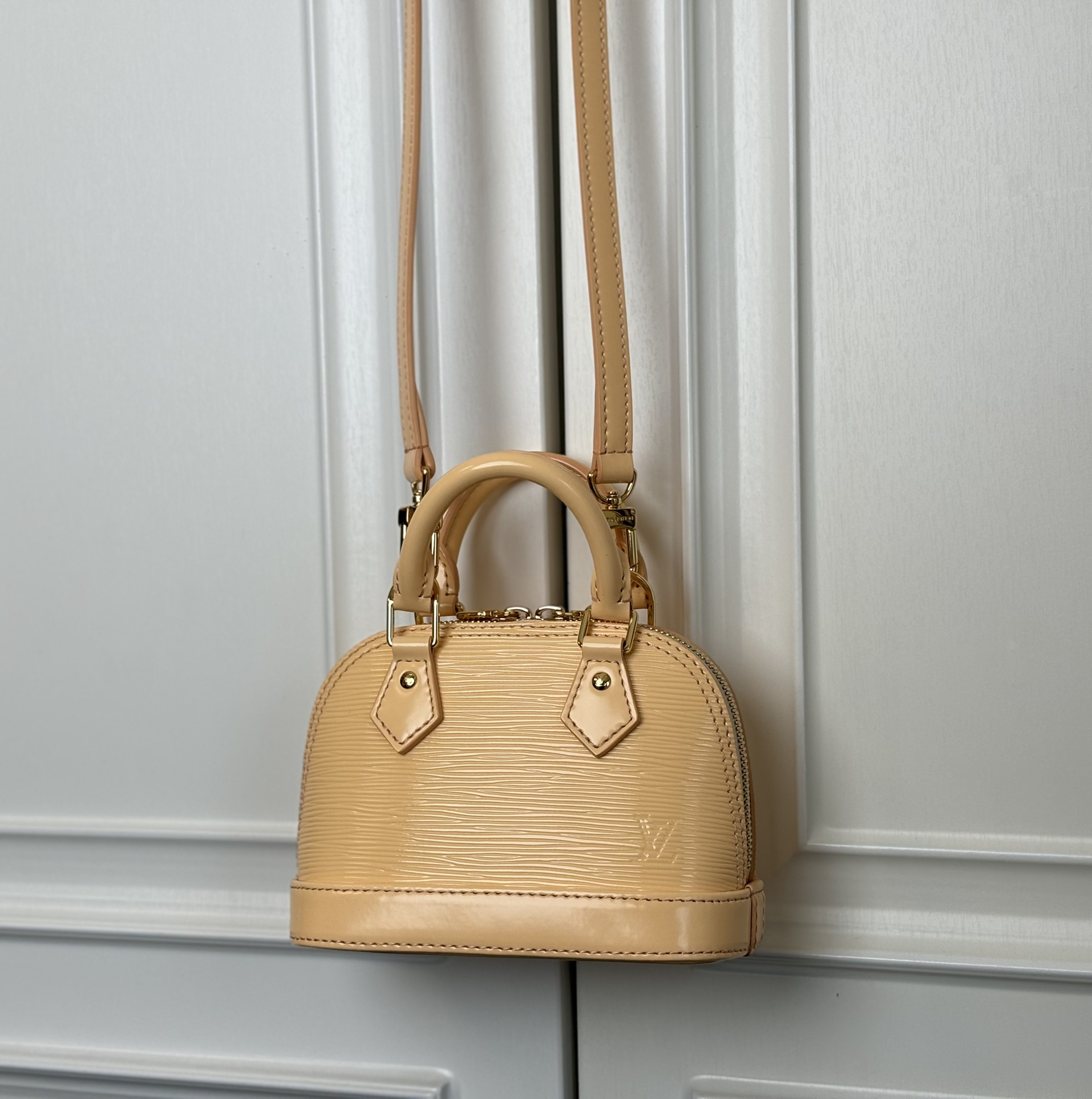 Louis Vuitton Nano Alma Epi Leather Crossbody Bag in Almond - Image 7