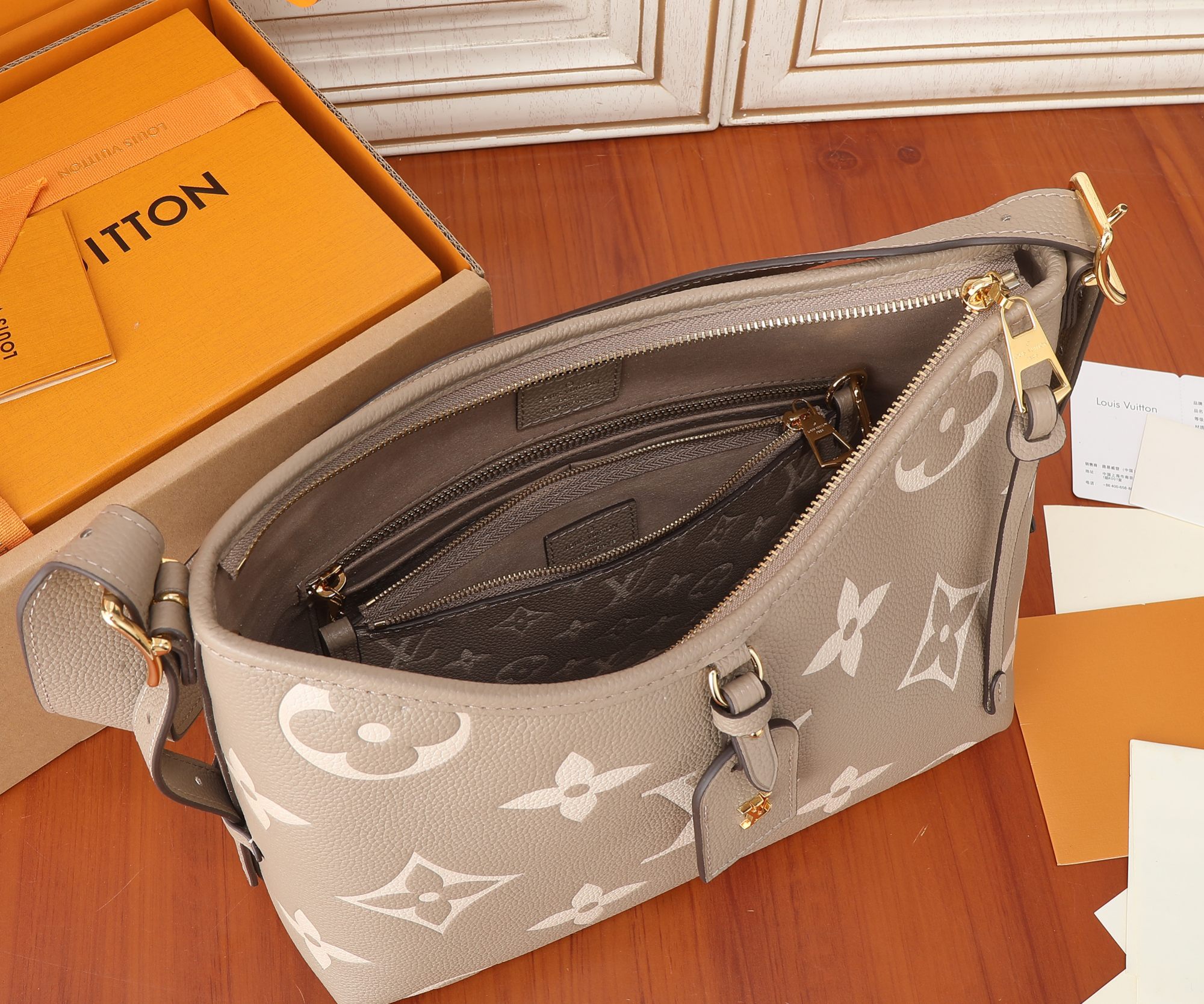Louis Vuitton CarryAll Small Handbag in Monogram Empreinte Leather - Image 8