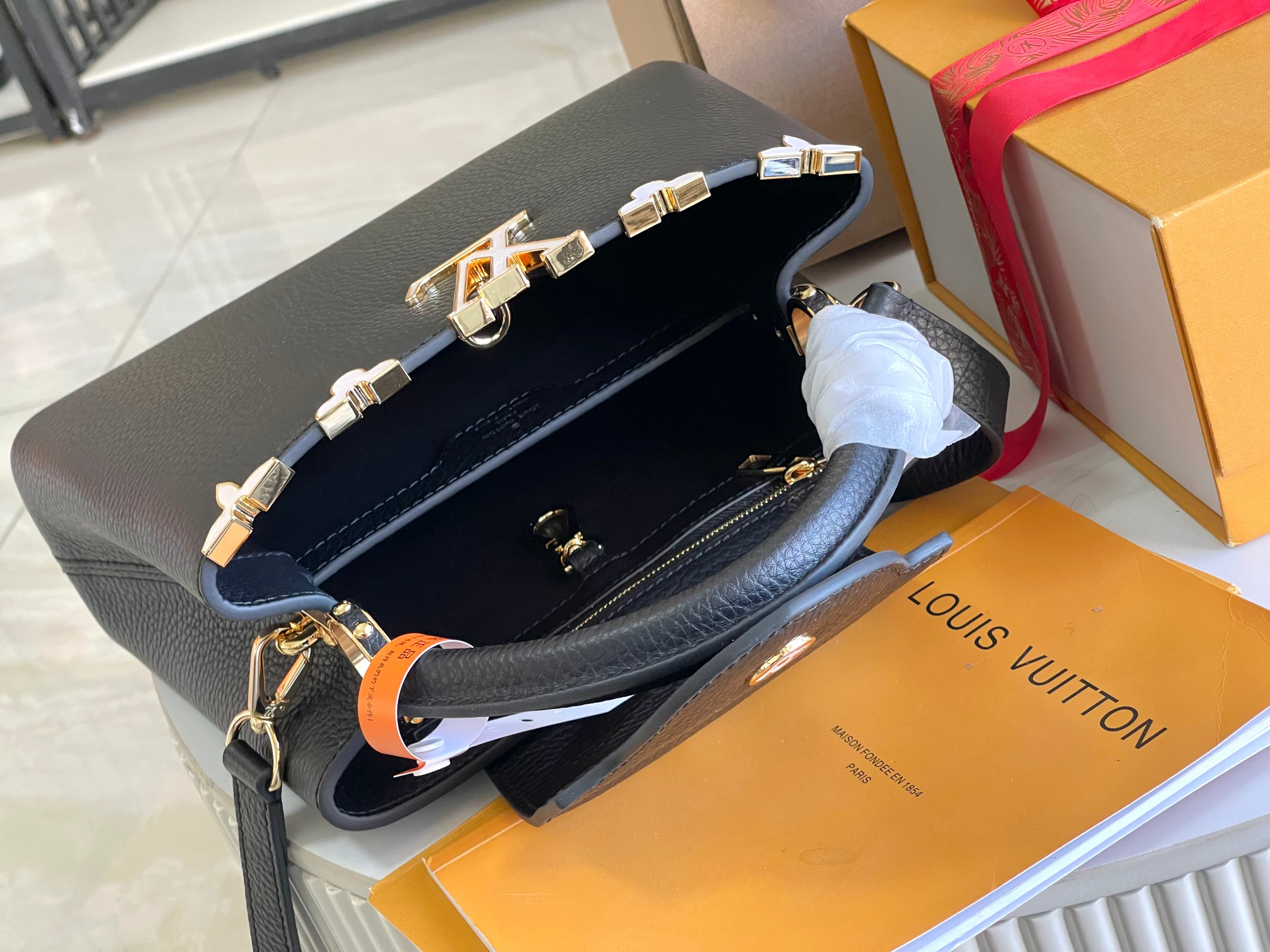 Louis Vuitton Capucines BB Small Handbag in White Leather with Gold-Tone Crown Detail - Image 8