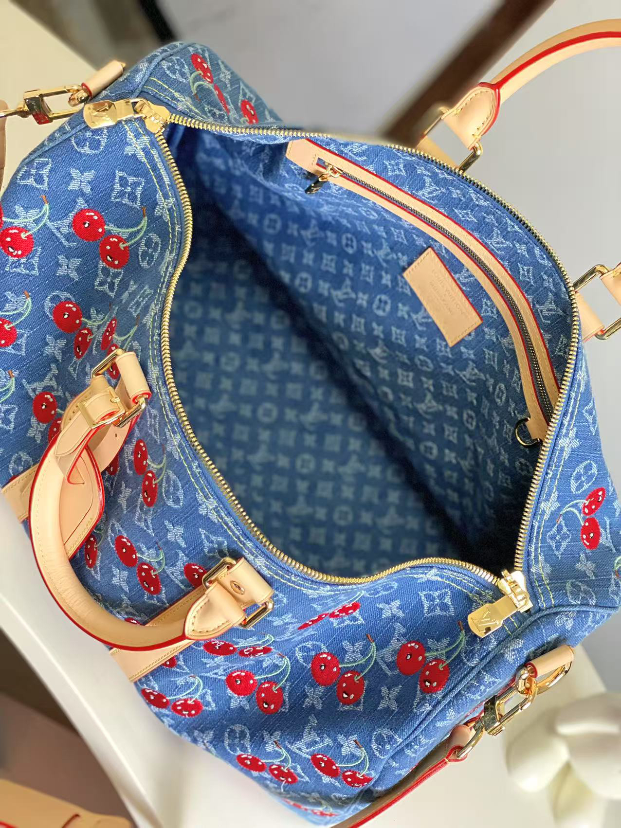 Louis Vuitton Keepall Bandoulière 45 Travel Bag in Monogram Denim with Cherry Embroidery - Image 8