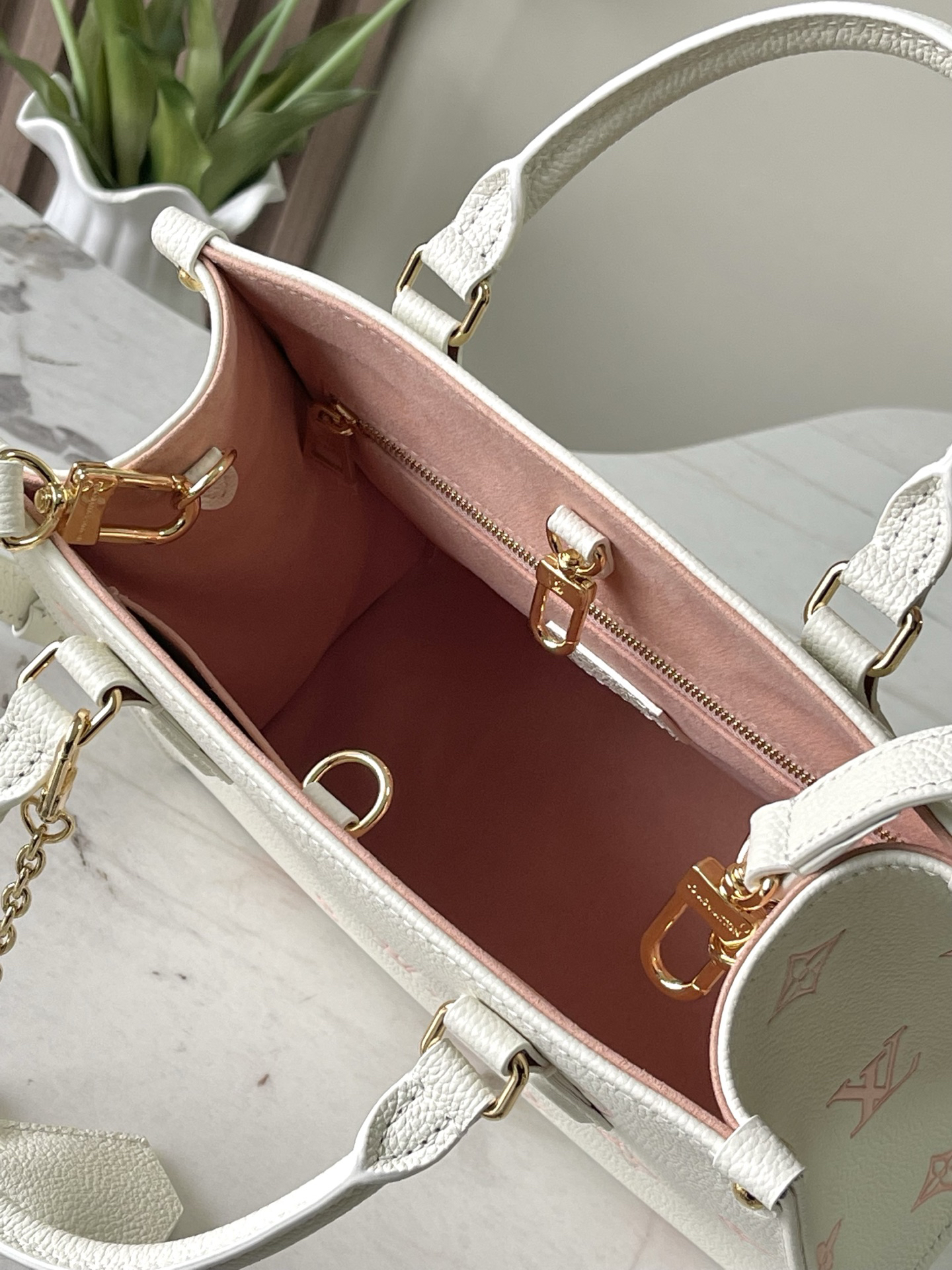 Louis Vuitton OnTheGo PM Tote Bag in Cream and Peach Pink Monogram Empreinte Leather - Image 8
