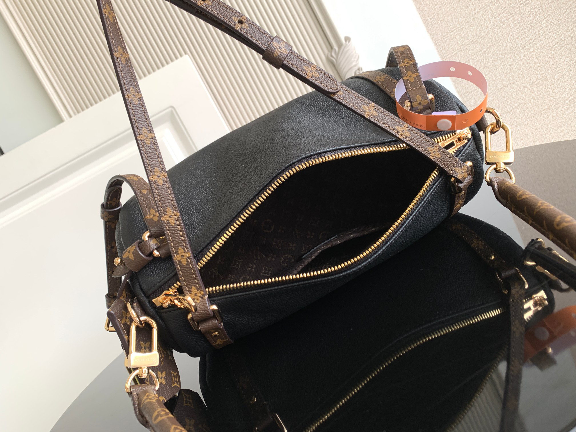Louis Vuitton Express Small Handbag - Image 8
