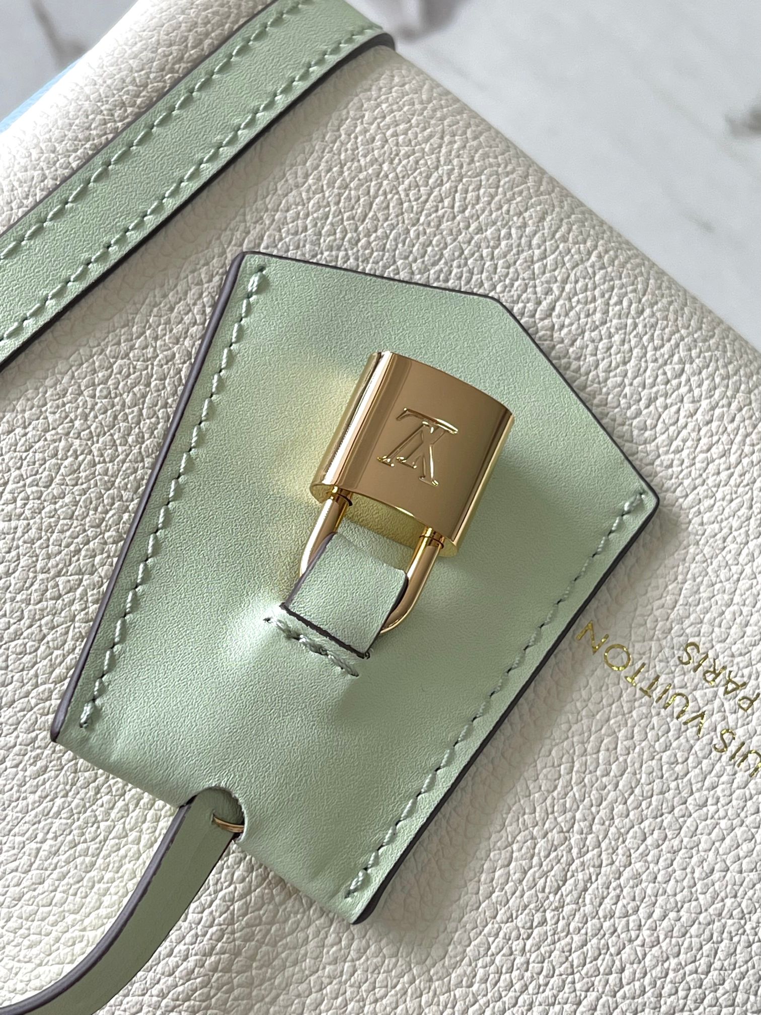 Louis Vuitton Express Small Handbag in Ivory Calfskin - Image 8