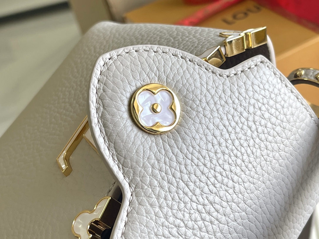 Louis Vuitton Capucines BB Handbag in White Calfskin with Gold-Tone Floral Detail - Image 8