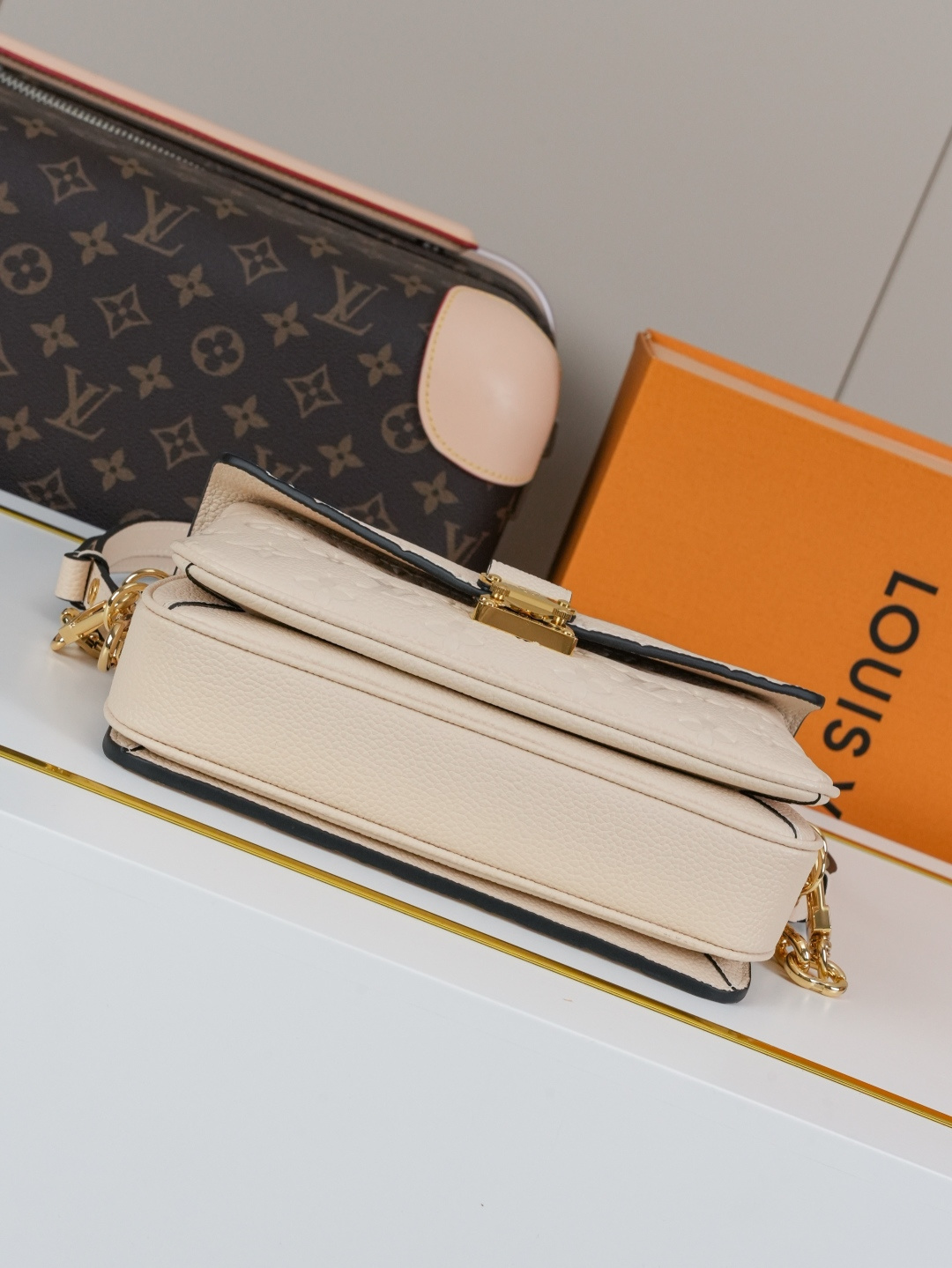 Pochette Métis East West Bag in Cream Monogram Empreinte Leather - Image 8