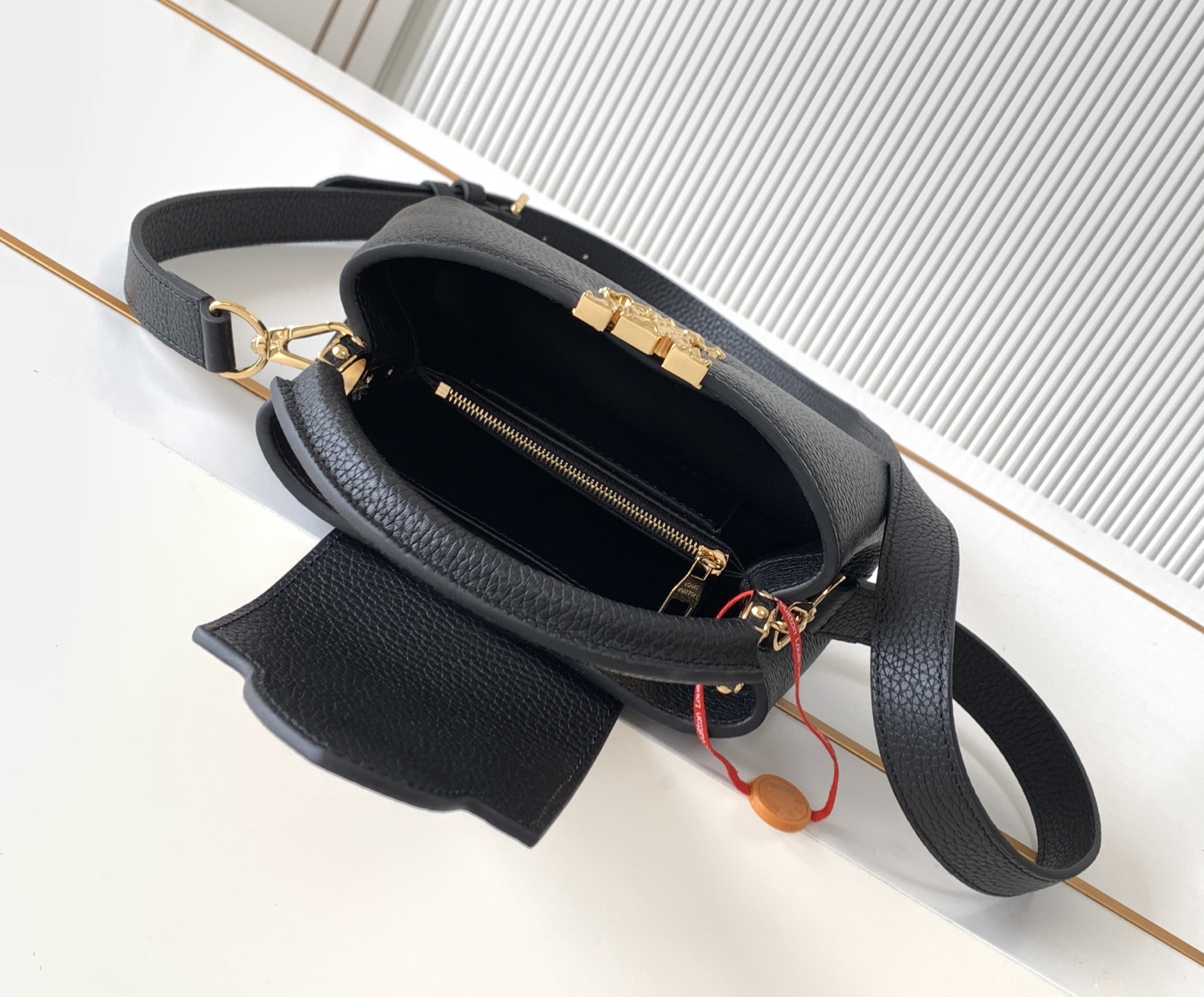Louis Vuitton Capucines East West Mini Handbag M24671 in Black - Image 8