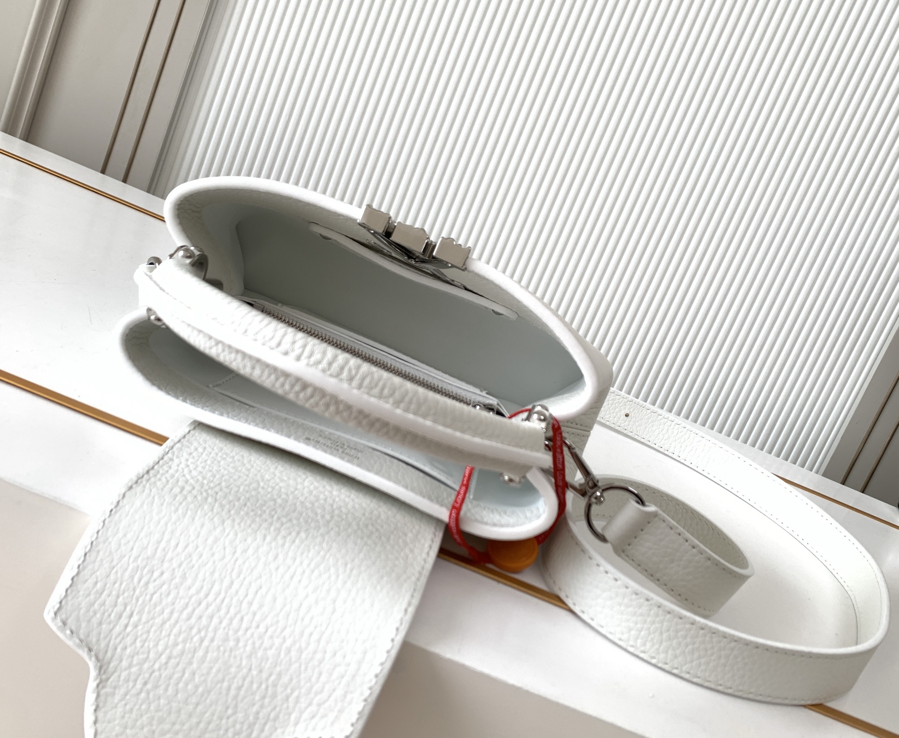 Louis Vuitton Capucines East West Mini Handbag M24671 in White - Image 8