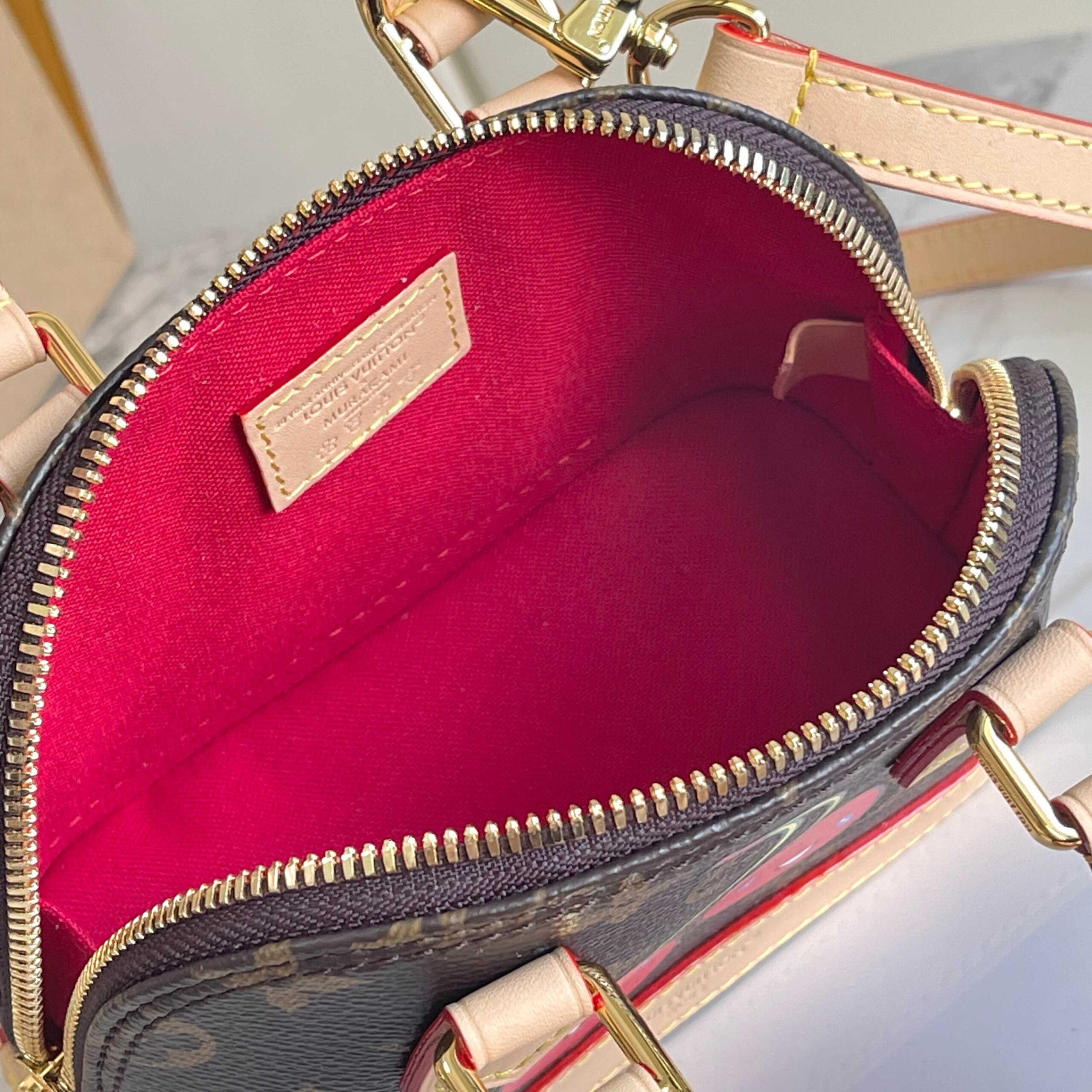 Louis Vuitton Nano Alma Cherry Monogram Handbag - Image 8
