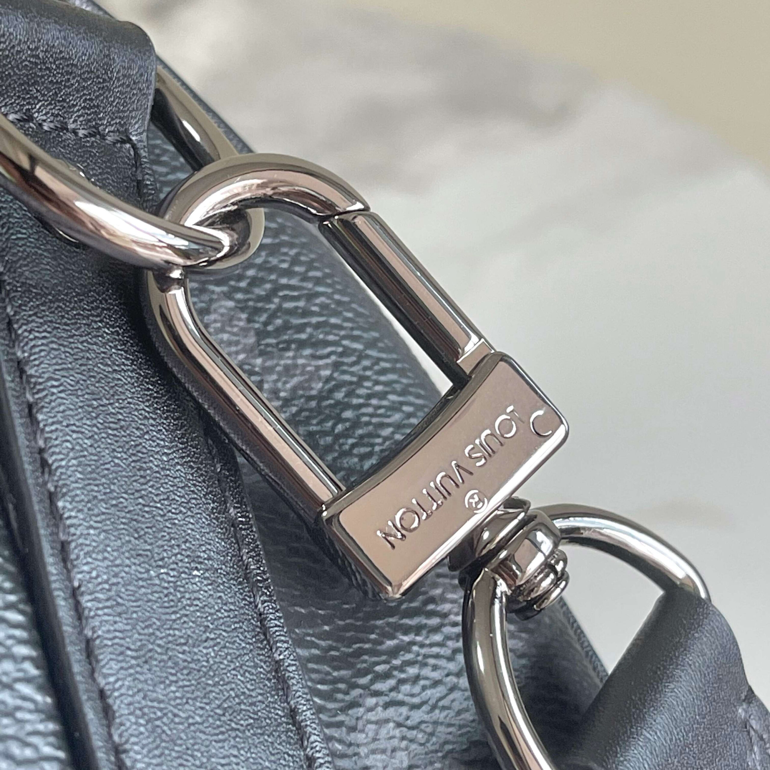 Louis Vuitton Keepall 25 Handbag in Monogram Eclipse Reverse Canvas - Image 8