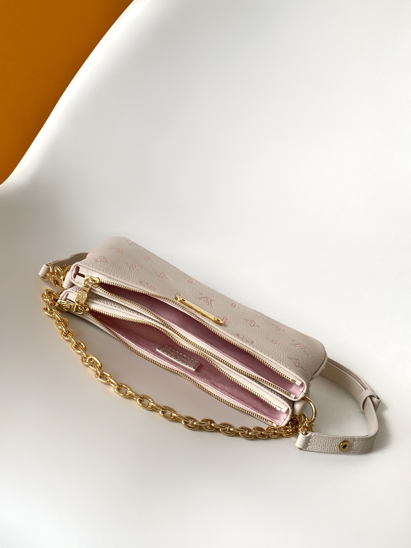 Louis Vuitton Liv Pochette in Monogram Empreinte Leather - Image 8