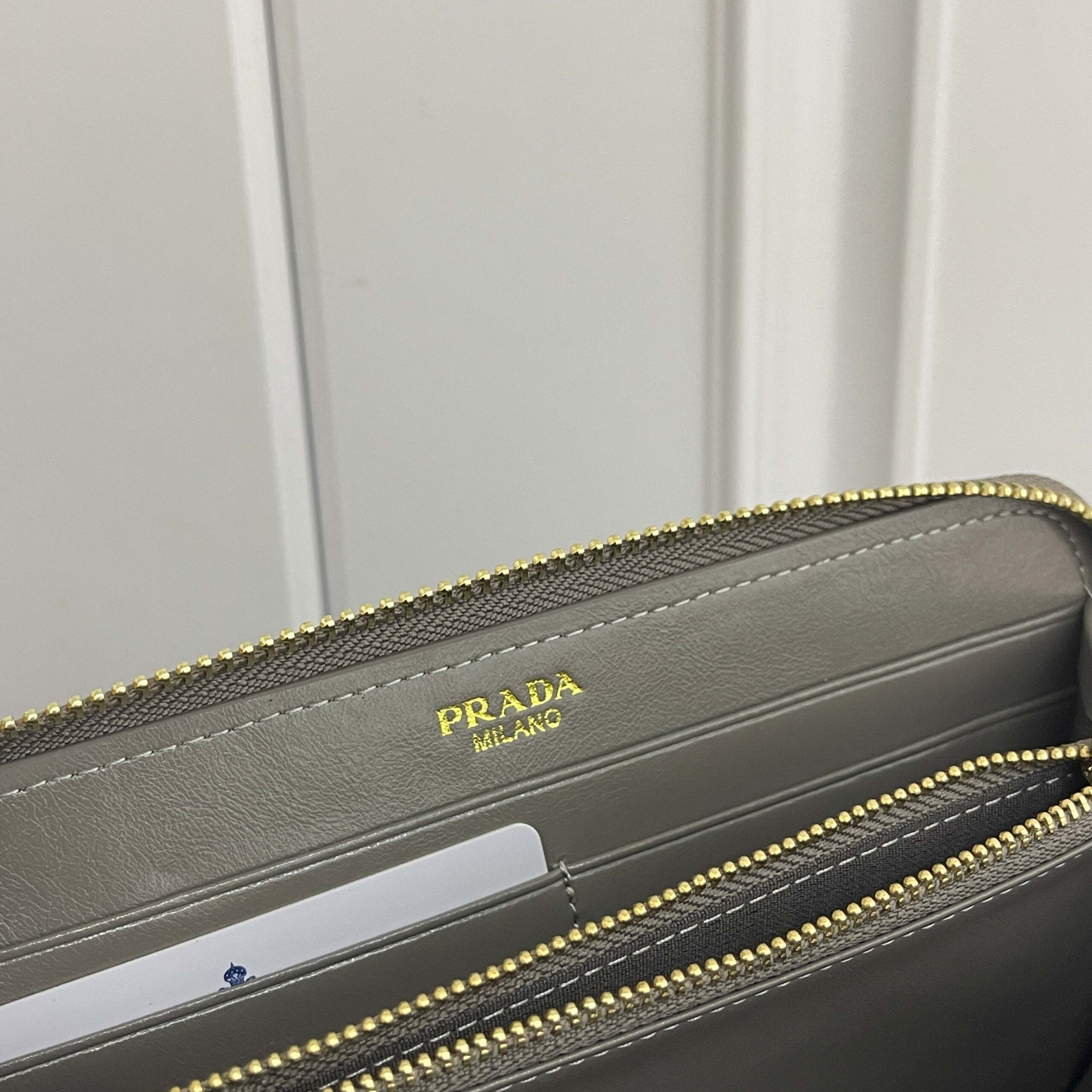 Prada Oil-Waxed Leather Wallet with Metal Triangle Logo - Image 8
