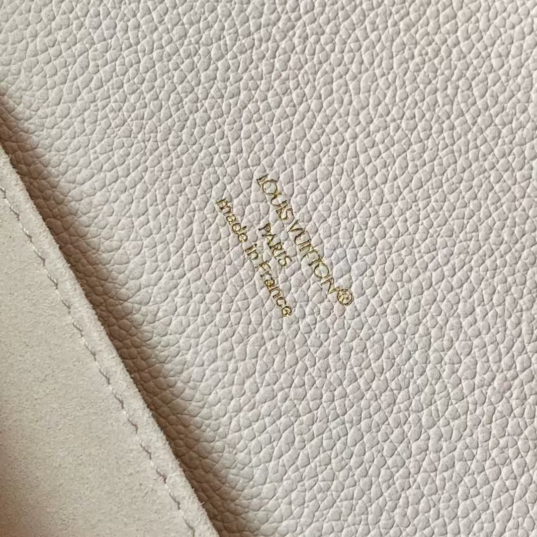 Louis Vuitton Pochette Métis East West Crossbody Bag in Textured Cowhide Leather - Image 9