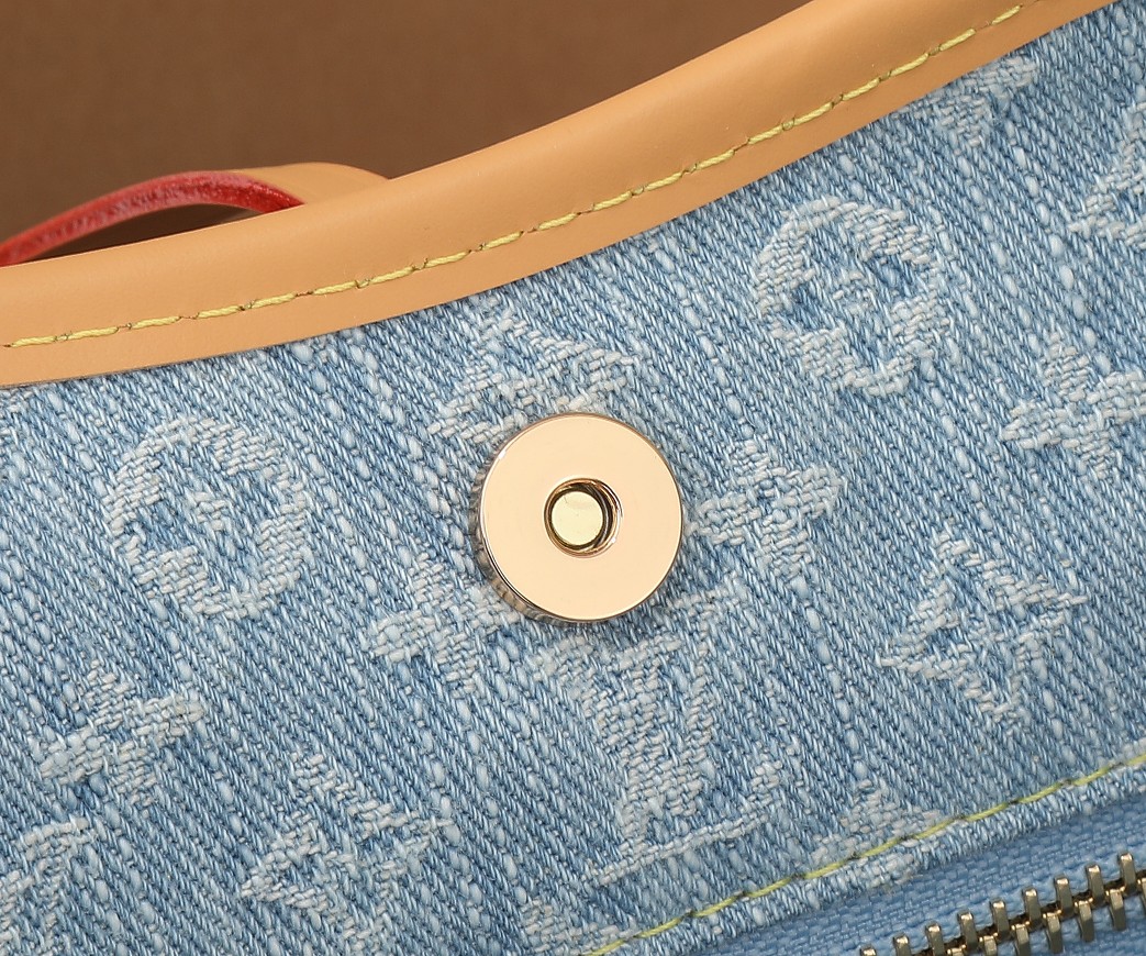Louis Vuitton Carryall Small Handbag in Monogram Denim - Image 9