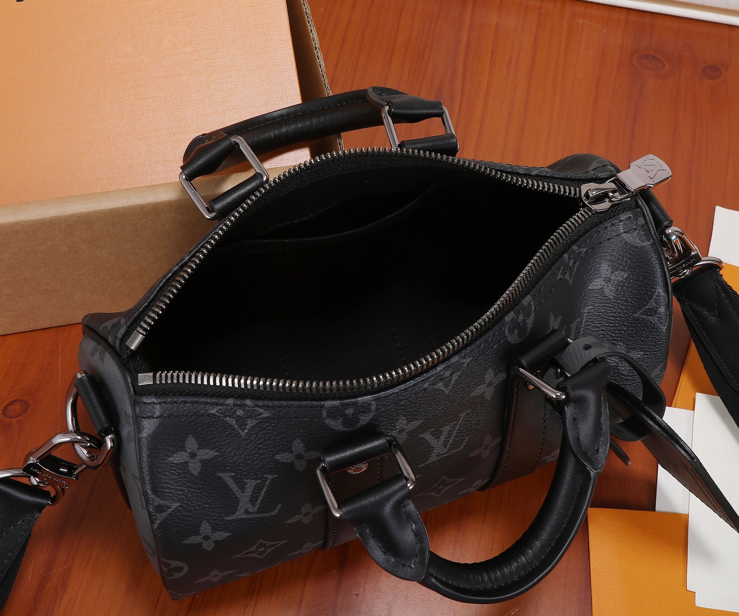 Louis Vuitton Keepall 25 Handbag in Monogram Eclipse Reverse Canvas - Image 9