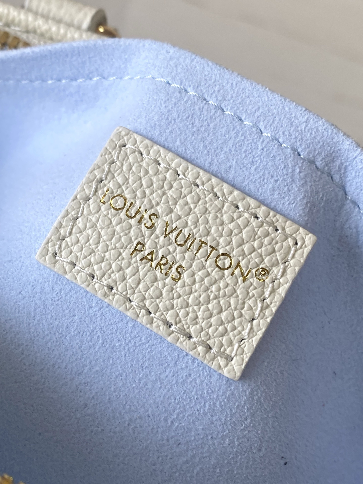 Louis Vuitton OnTheGo EW Monogram Empreinte Leather Tote Bag in Sea Salt Blue - Image 9