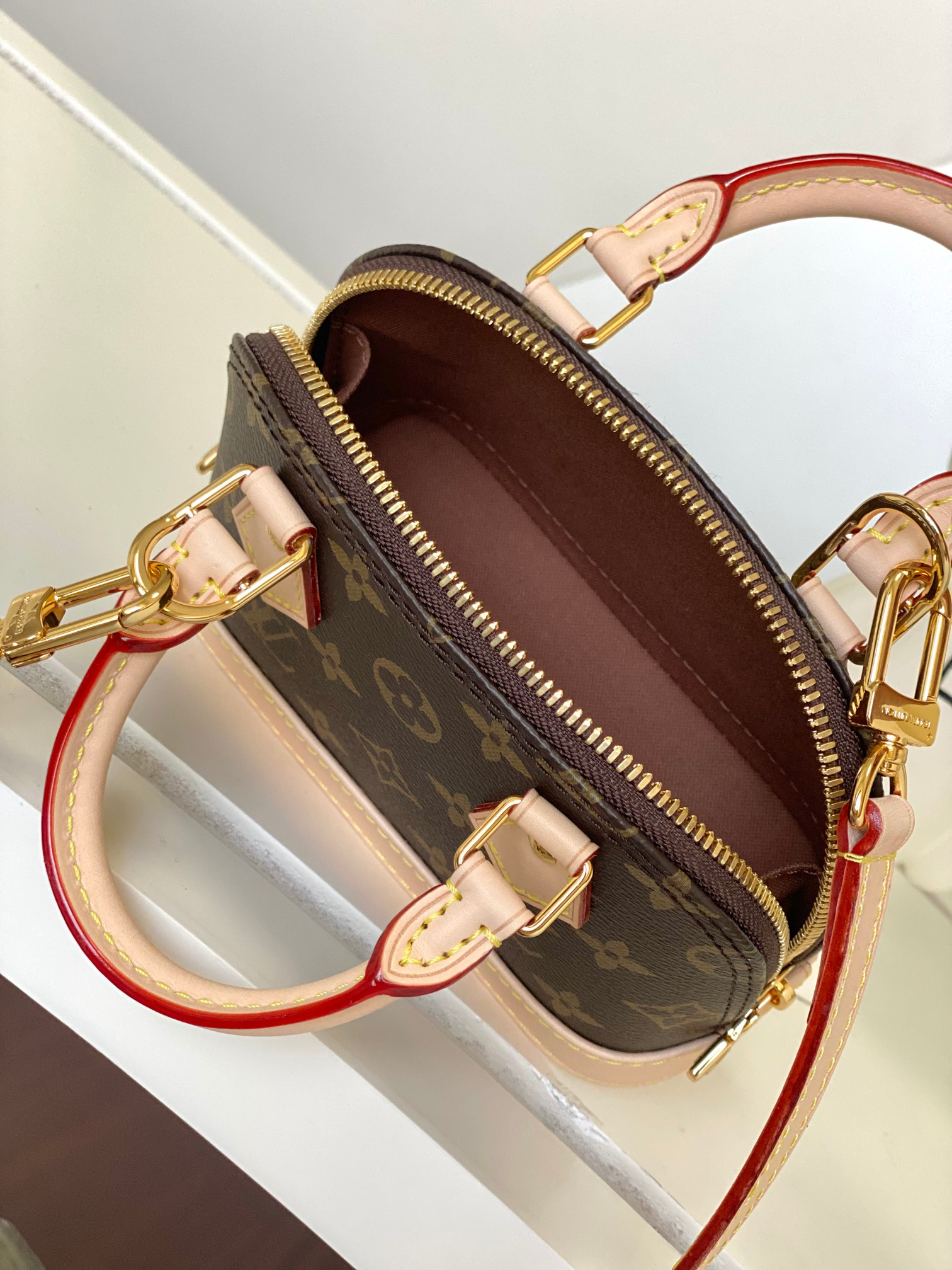 Louis Vuitton Alma Nano Monogram Canvas Handbag - Image 9