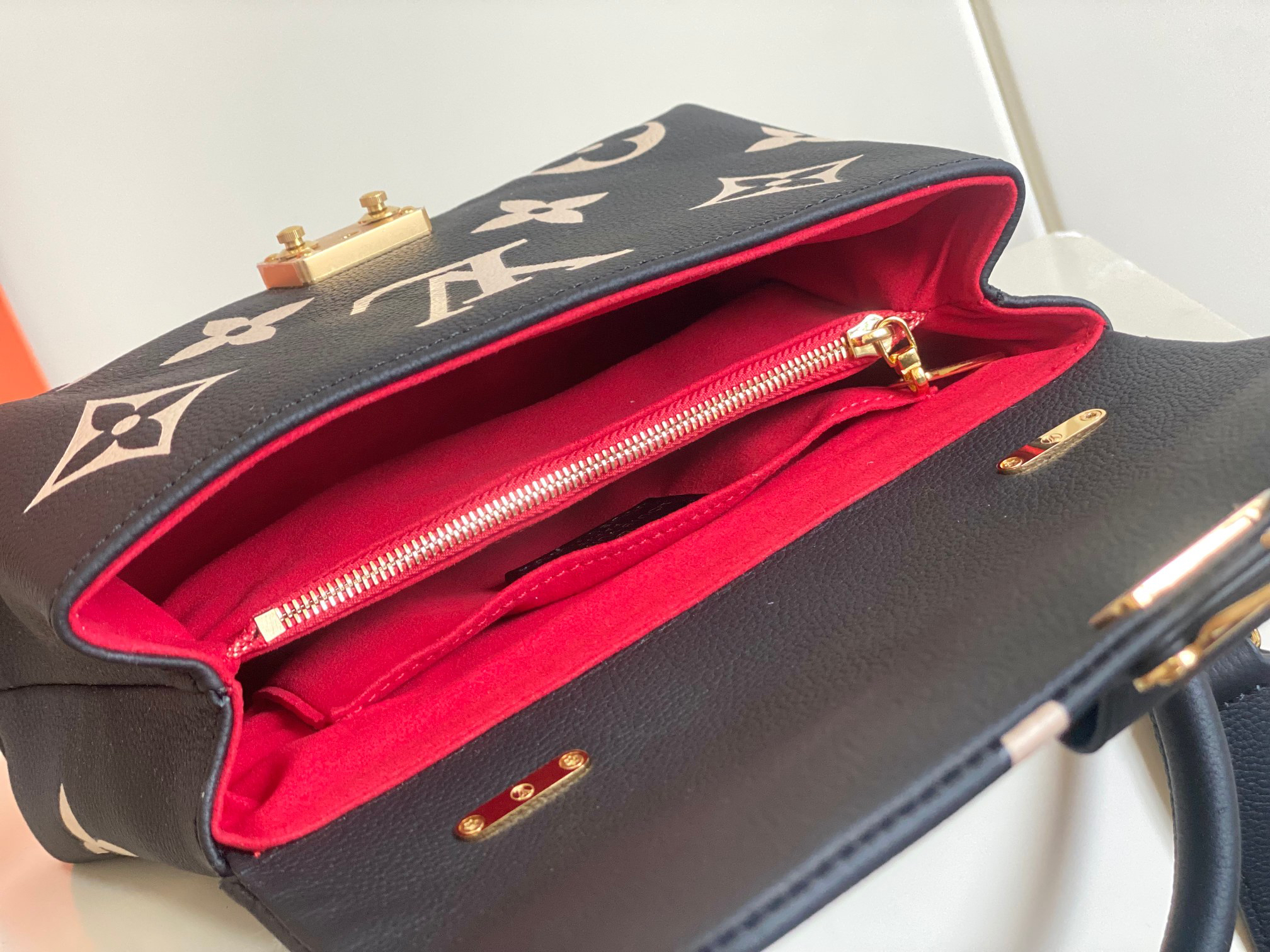 Madeleine BB Handbag in Monogram Empreinte Leather - Image 9