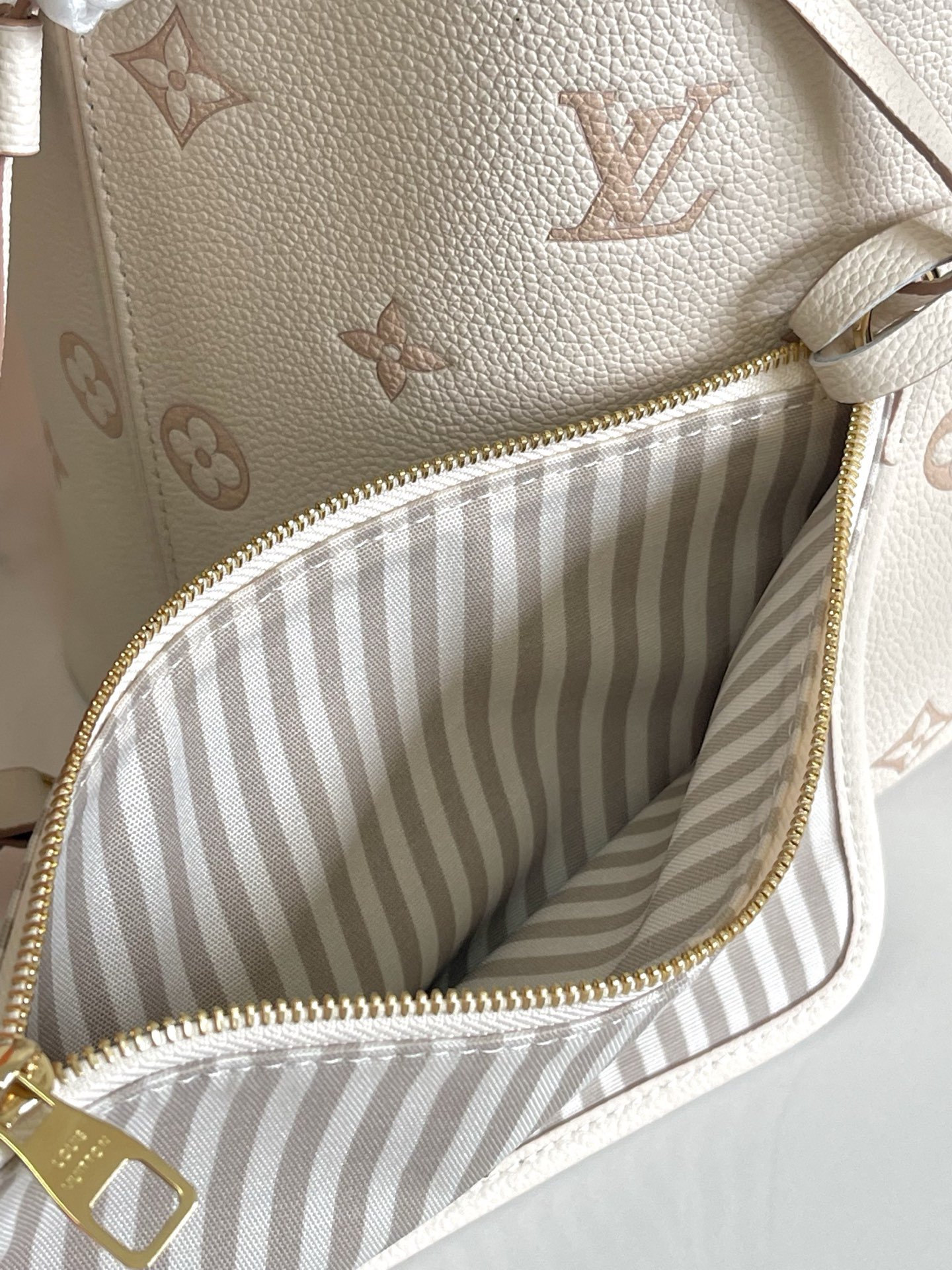 Neverfull MM Monogram Empreinte Leather Tote Bag - Image 9