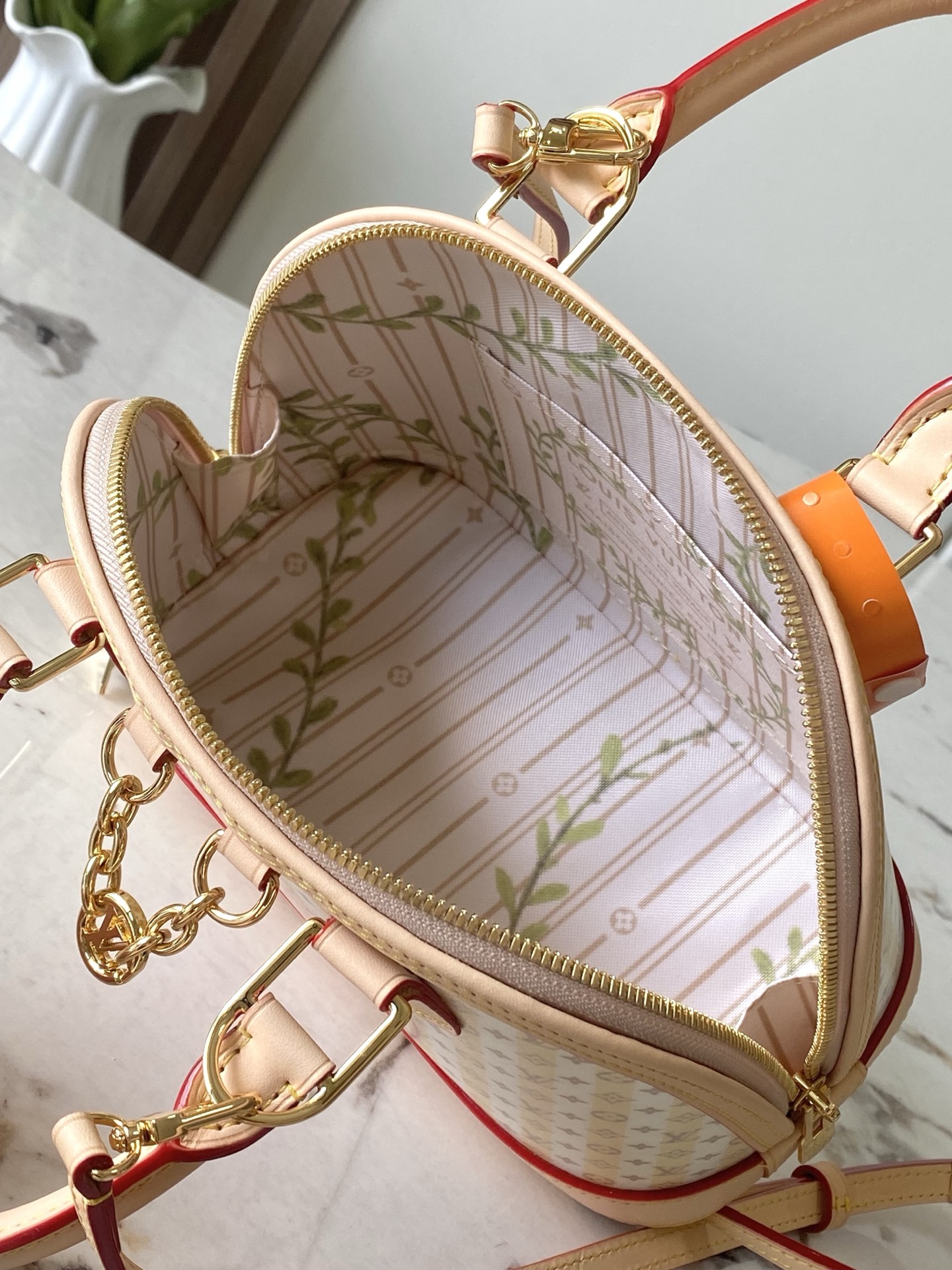Louis Vuitton Alma BB Handbag in Beige Monogram Leather - Image 9