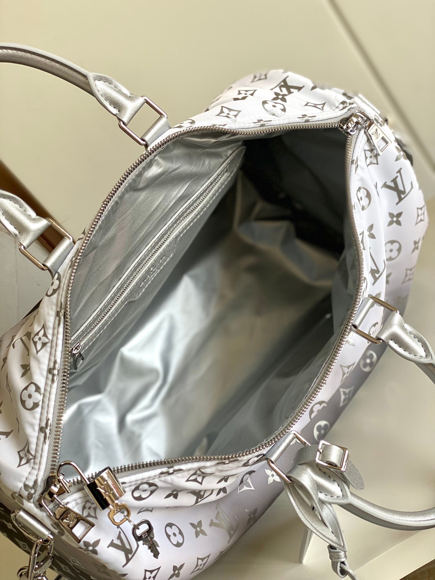 Keepall Bandoulière 45 Travel Bag in Silver Monogram - Image 9
