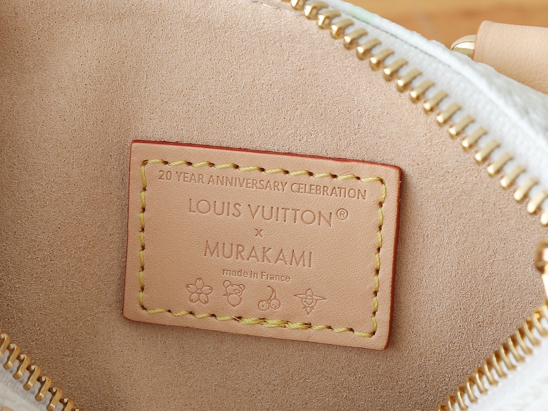 Louis Vuitton Nano Speedy Handbag in Monogram Coated Canvas - Image 9