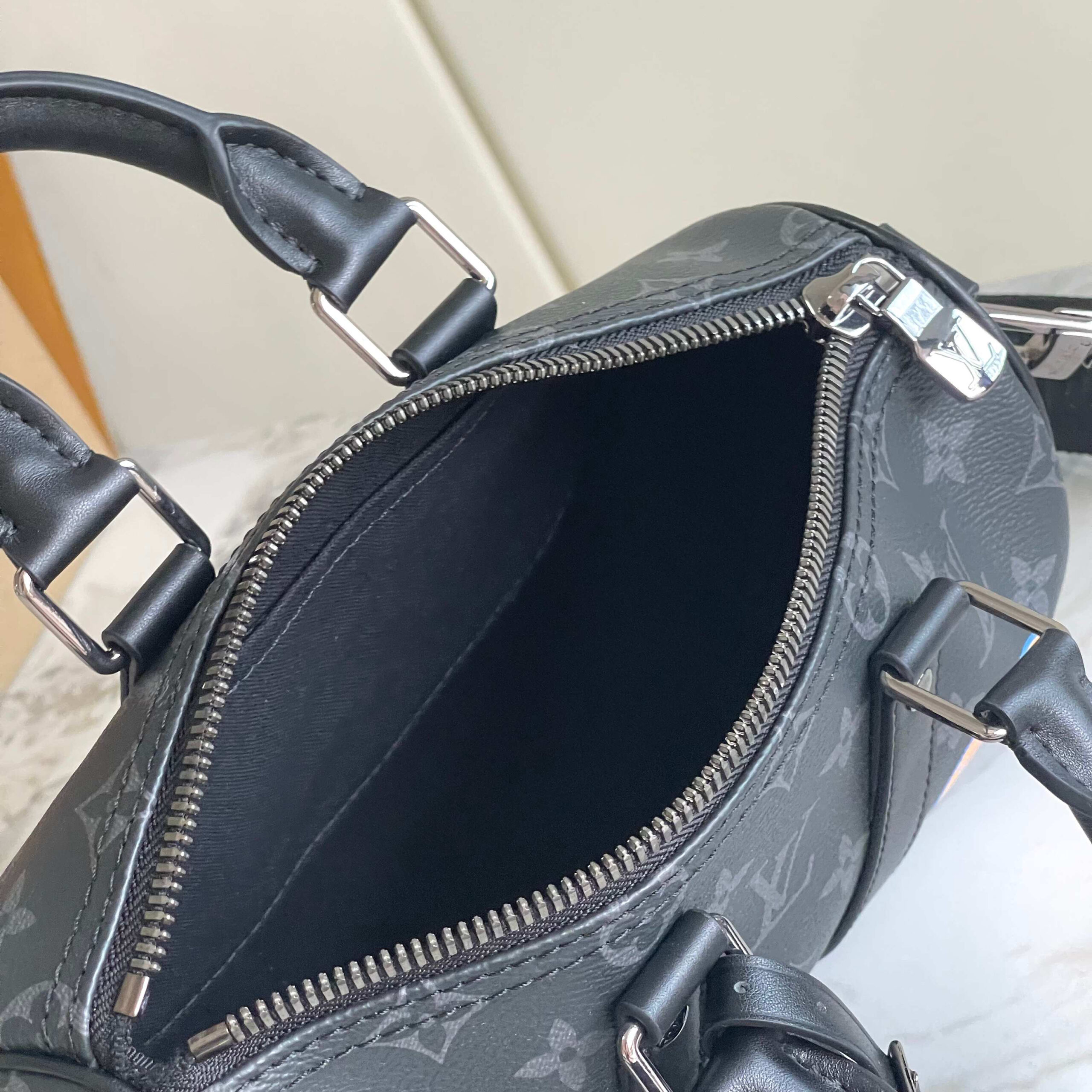 Louis Vuitton Keepall 25 Handbag in Monogram Eclipse Reverse Canvas - Image 9